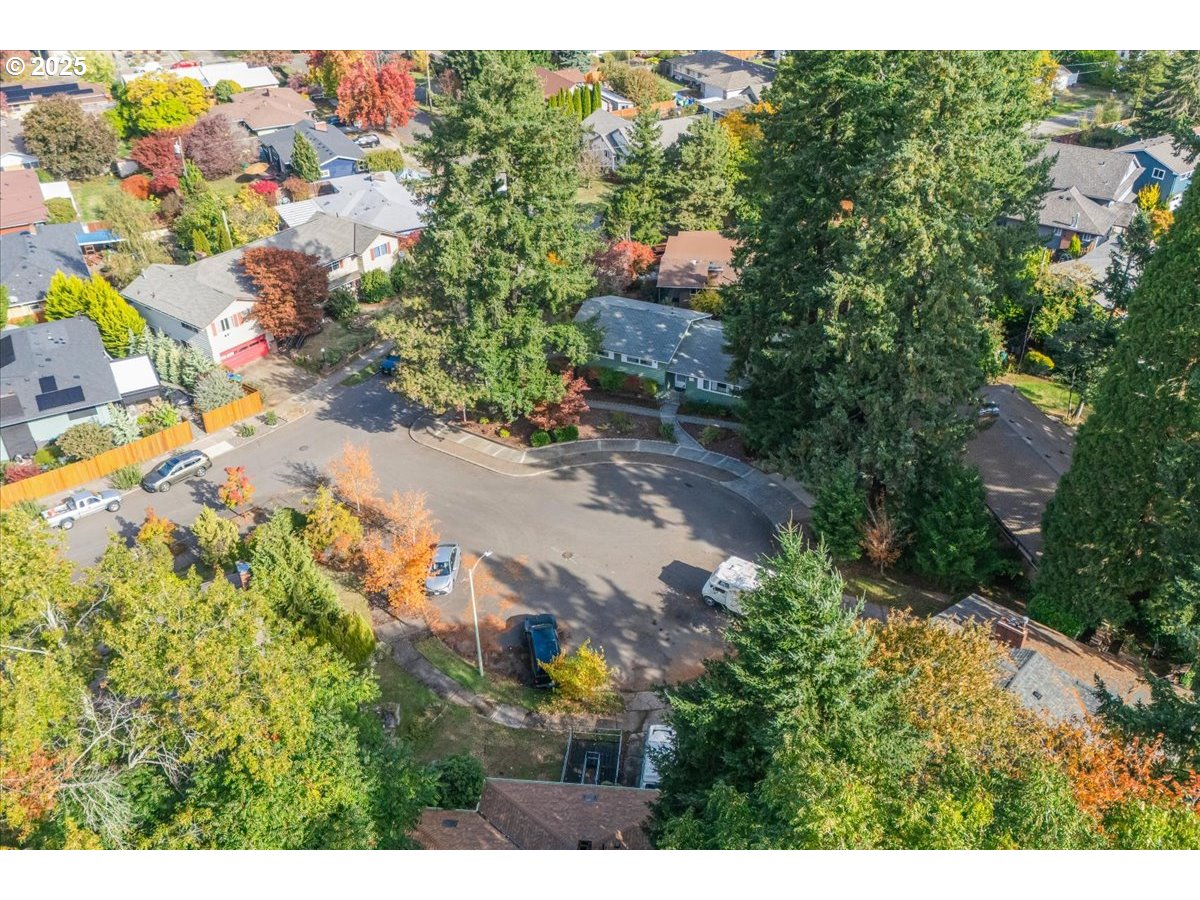 11030 Northeast Davis Street Portland, OR 97220 - Photo 8 of 48 a view of a and covered with lush green forest