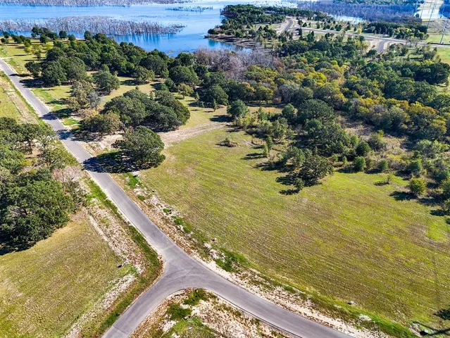 a view of swimming pool from a lake view