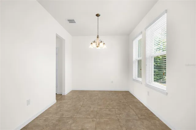 a view of a room with windows