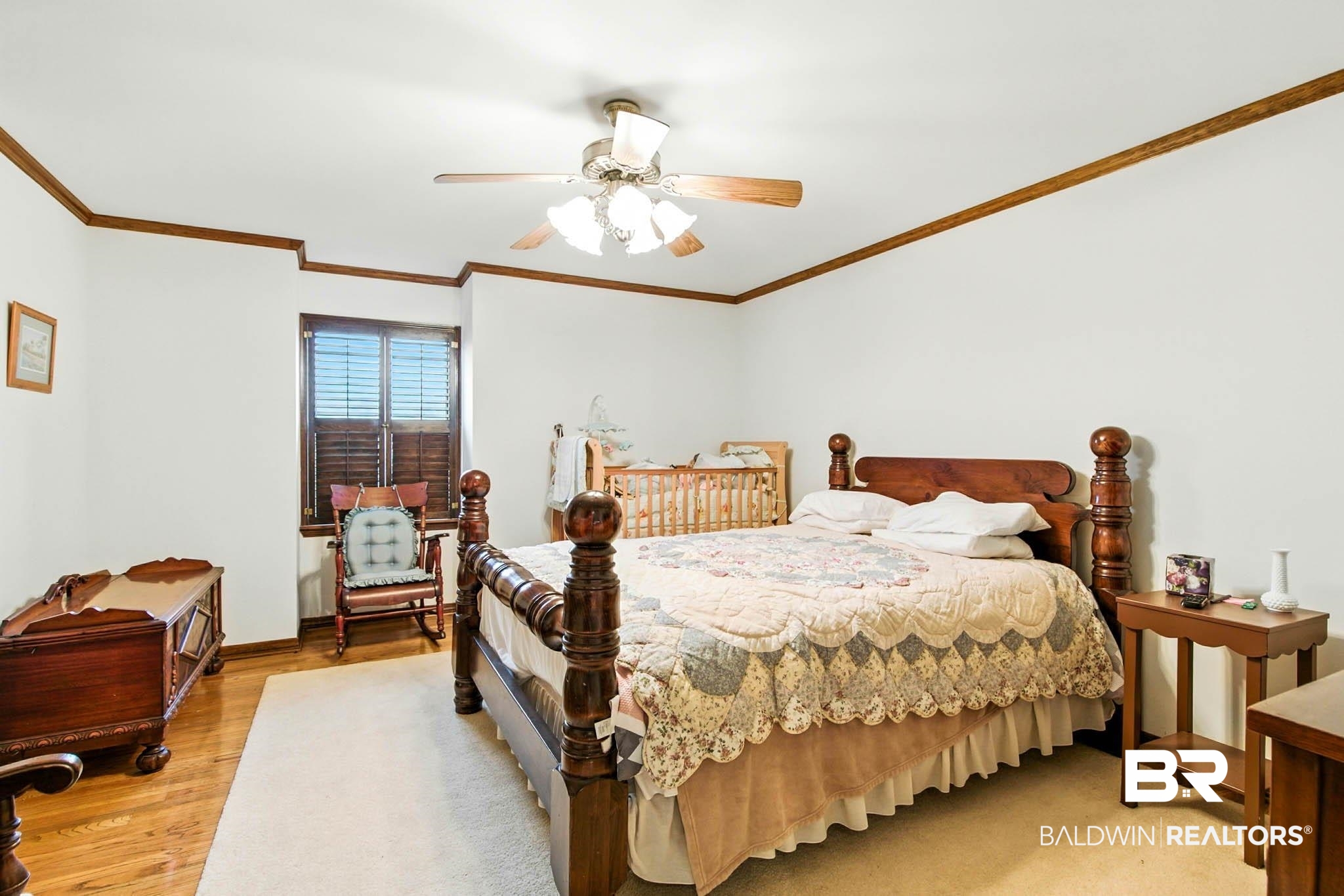 17270 Davis Road Summerdale, AL 36580 - Photo 23 of 97 Bedroom with ornamental molding, a ceiling fan, and light wood finished floors