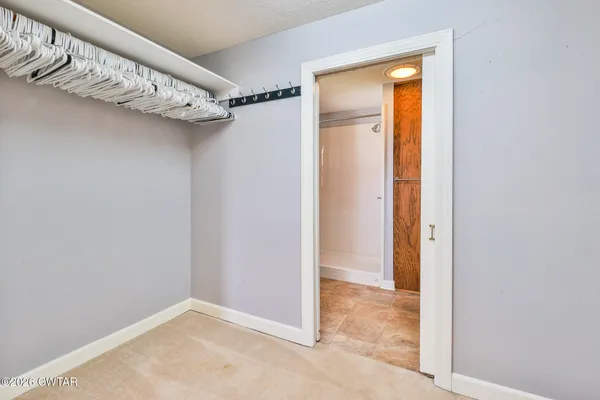 a view of a room with an empty space