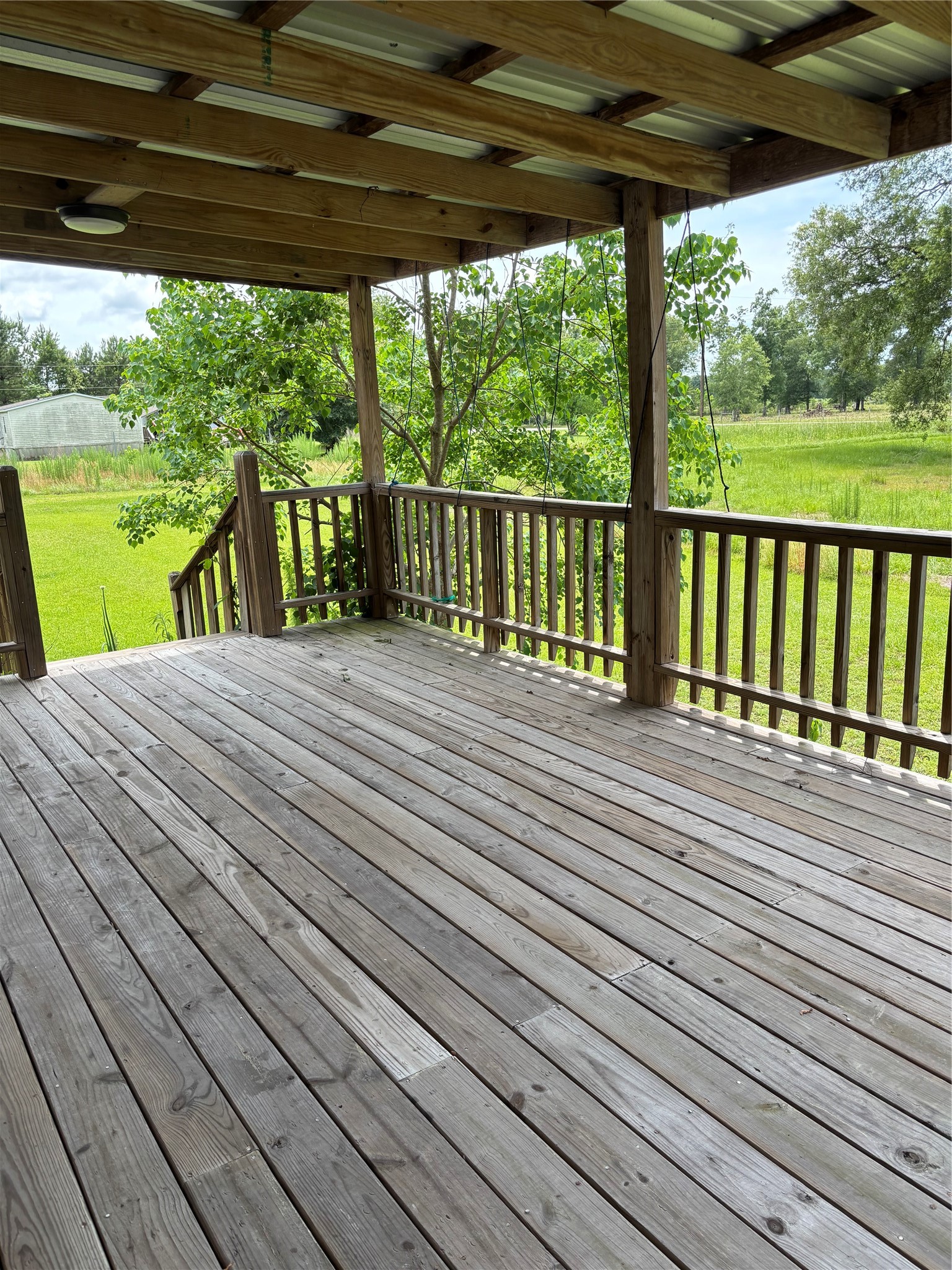 35599 State Highway South Buna, TX 77612 - Photo 5 of 40 a view of a wooden deck