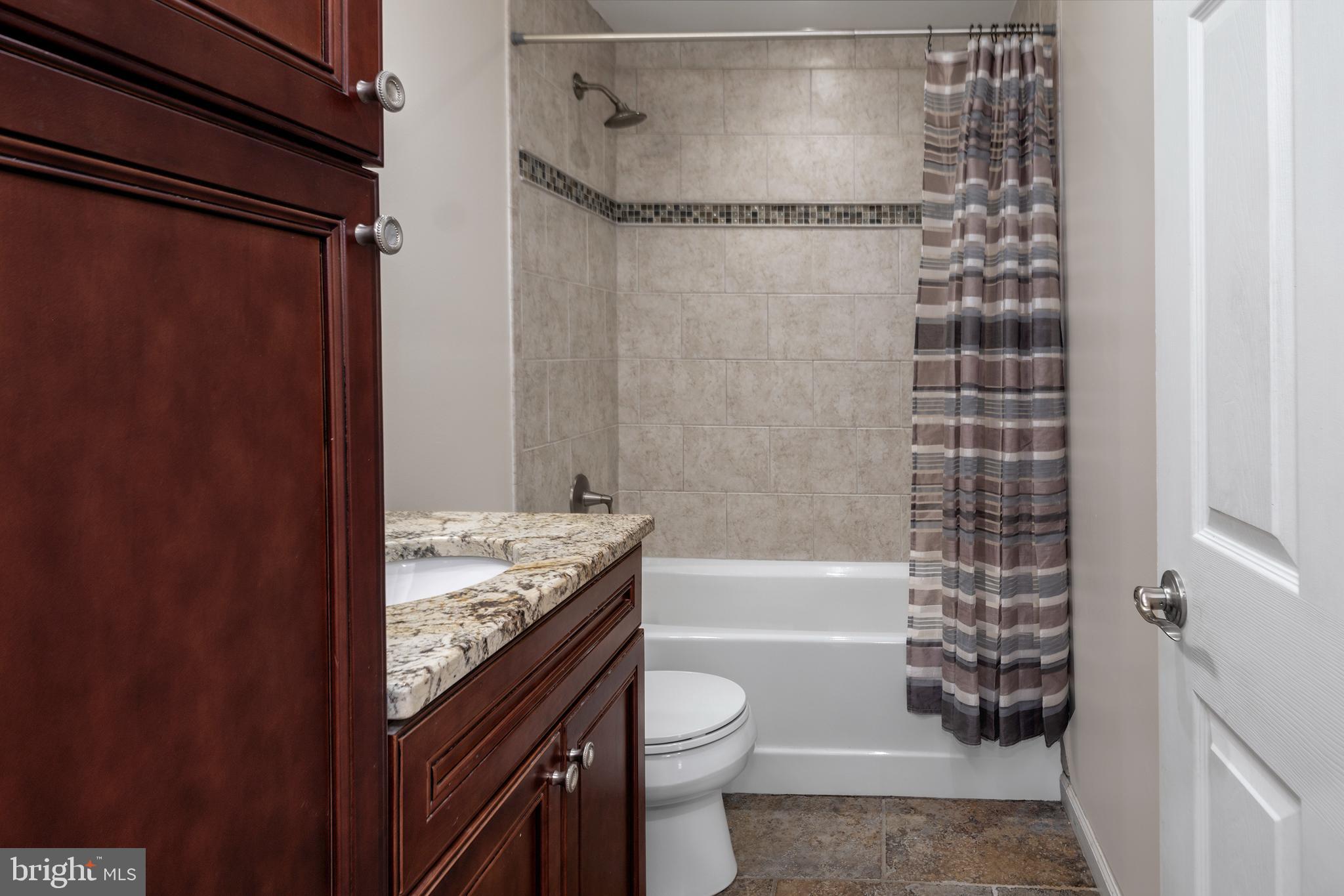 33 Gilmore Road Ewing, NJ 08628 - Photo 14 of 21 a bathroom with a sink toilet and shower