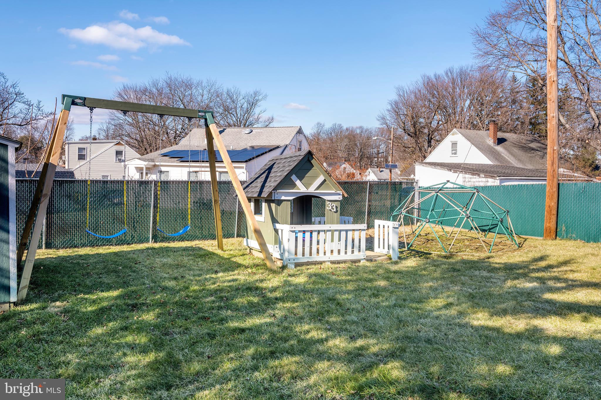 33 Gilmore Road Ewing, NJ 08628 - Photo 17 of 21 a view of a house with a yard and a garden