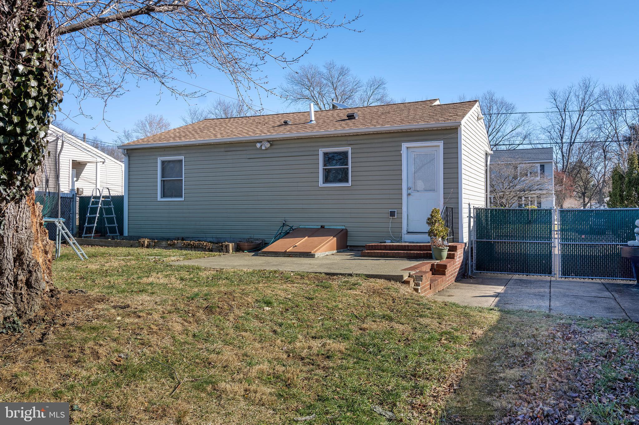 33 Gilmore Road Ewing, NJ 08628 - Photo 18 of 21 a backyard of a house with seating space