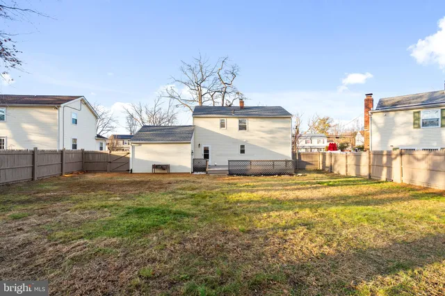 a house with trees in front of it