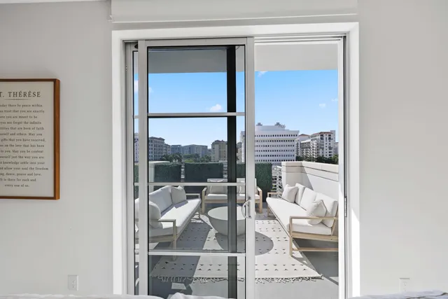 a outdoor living space with furniture and a potted plant