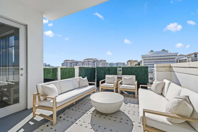 a view of sitting area with furniture and a couch