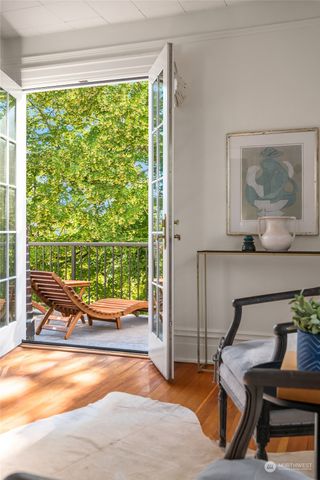 a view of a balcony with chairs