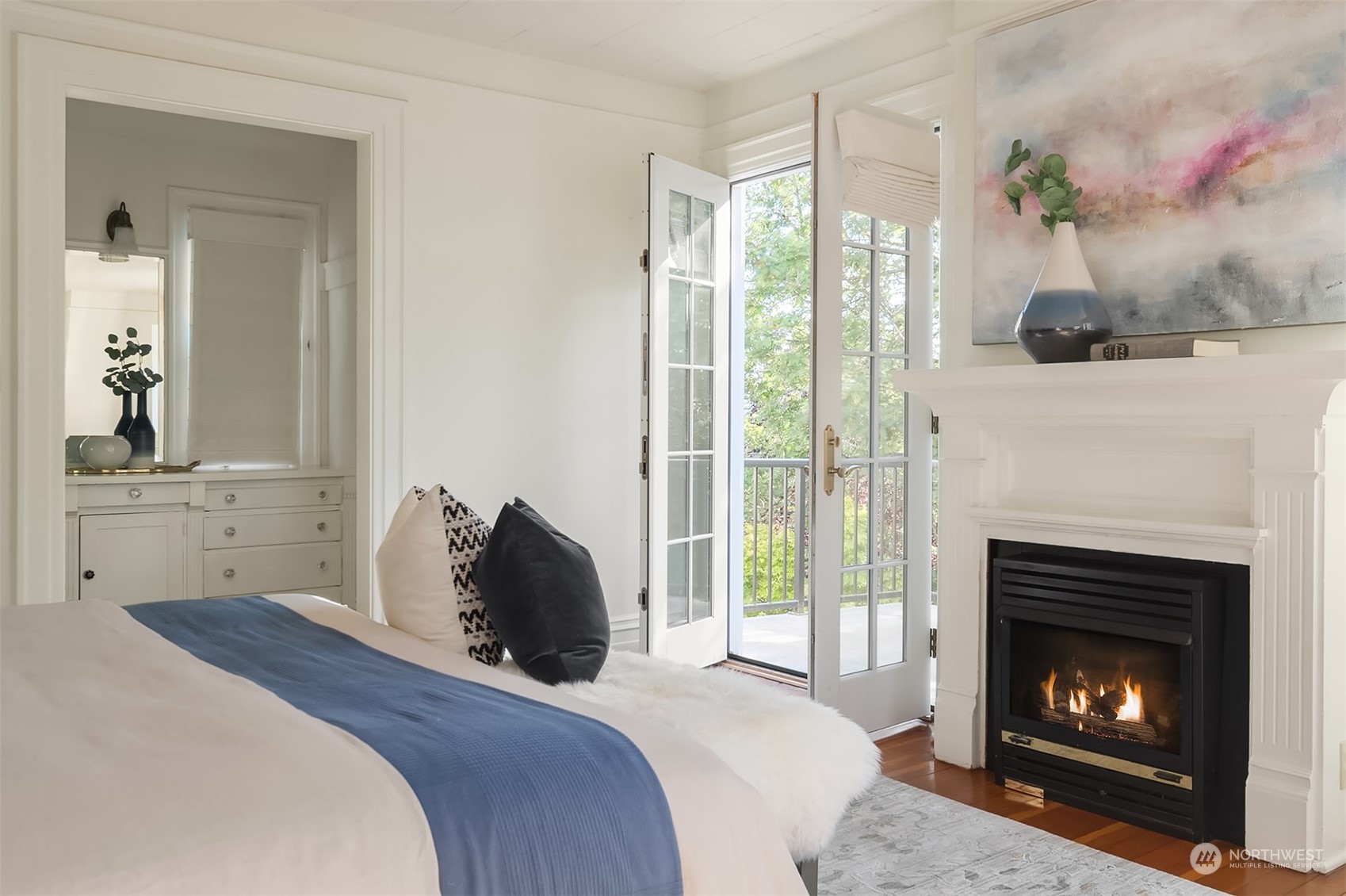 1505 North 43rd Street Seattle, WA 98103 - Photo 21 of 40 a bedroom with a bed and a fireplace