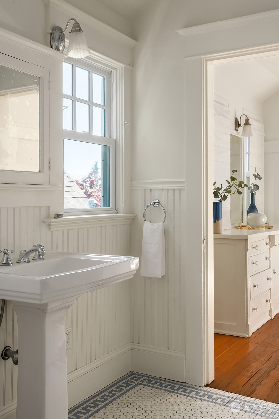 1505 North 43rd Street Seattle, WA 98103 - Photo 22 of 40 a bathroom with a sink a vanity and a bathtub