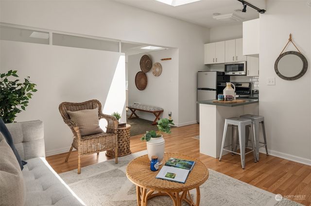 a bedroom with a bed and cabinets