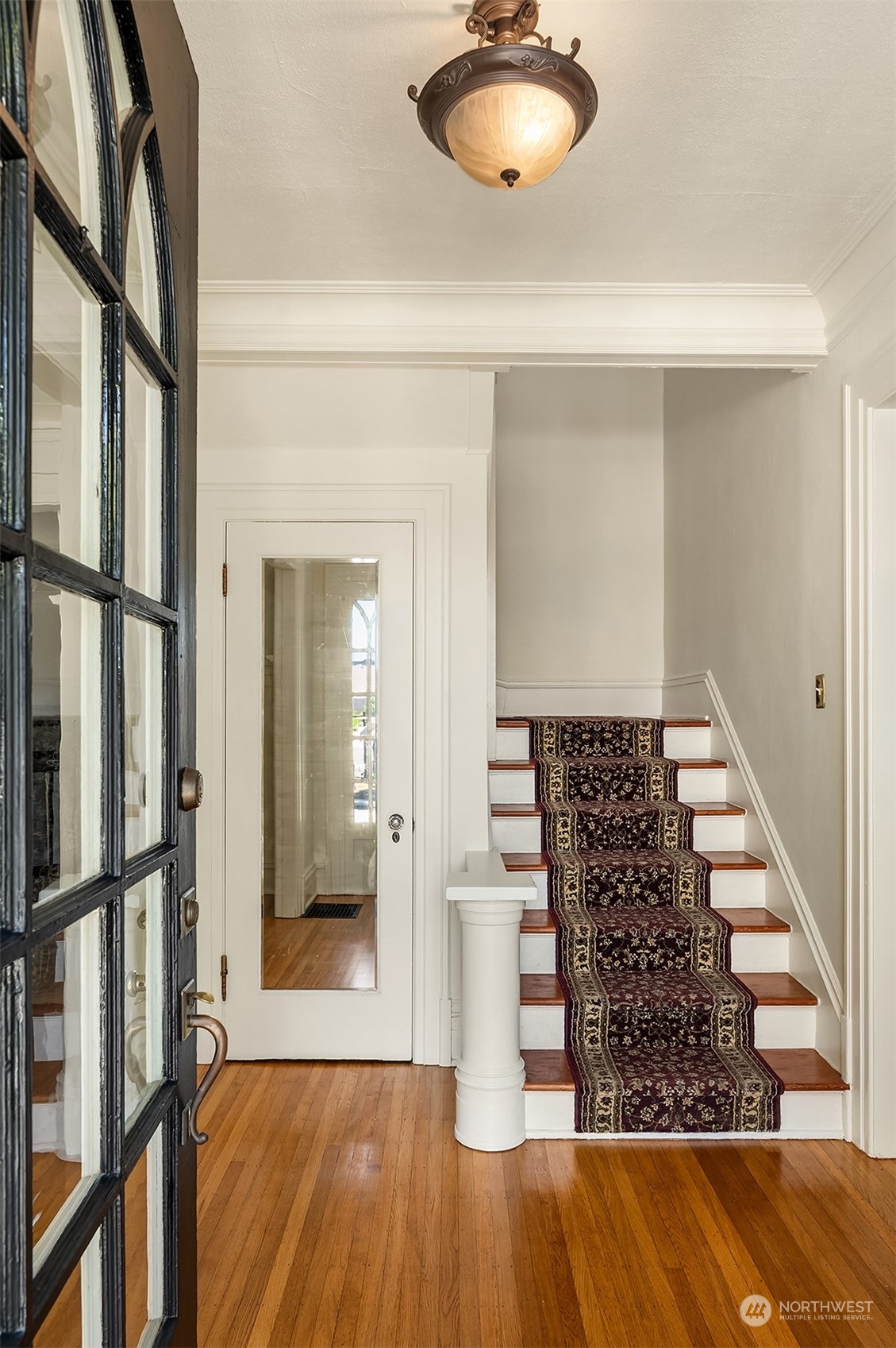 1505 North 43rd Street Seattle, WA 98103 - Photo 3 of 40 a view of a livingroom with wooden floor and furniture