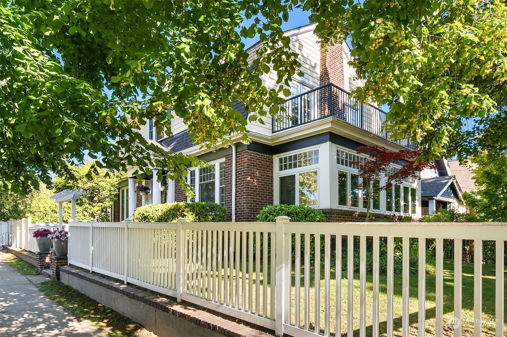 1505 North 43rd Street Seattle, WA 98103 - Photo 34 of 40 a front view of a house with a garden