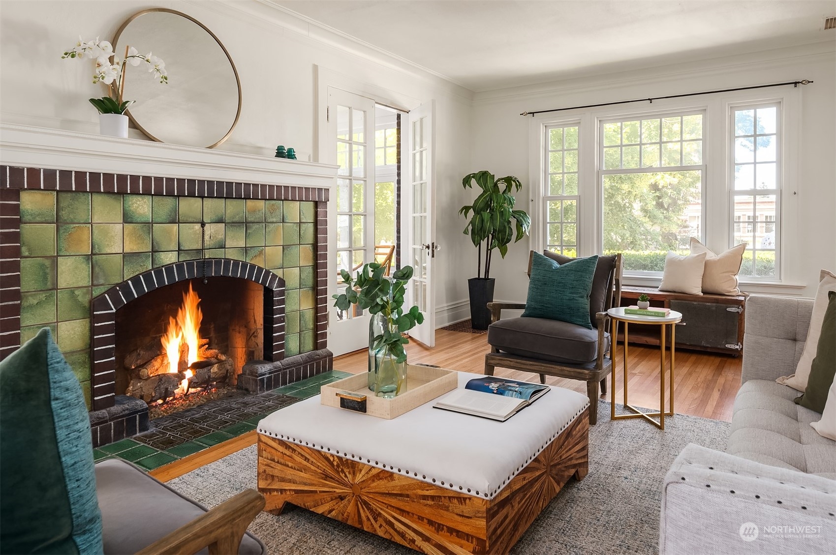 1505 North 43rd Street Seattle, WA 98103 - Photo 6 of 40 a living room with furniture a fireplace and a large window