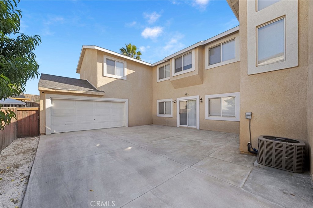 1494 Rabbit Peak Way Hemet, CA 92545 - Photo 4 of 45 a view of a house with backyard and deck
