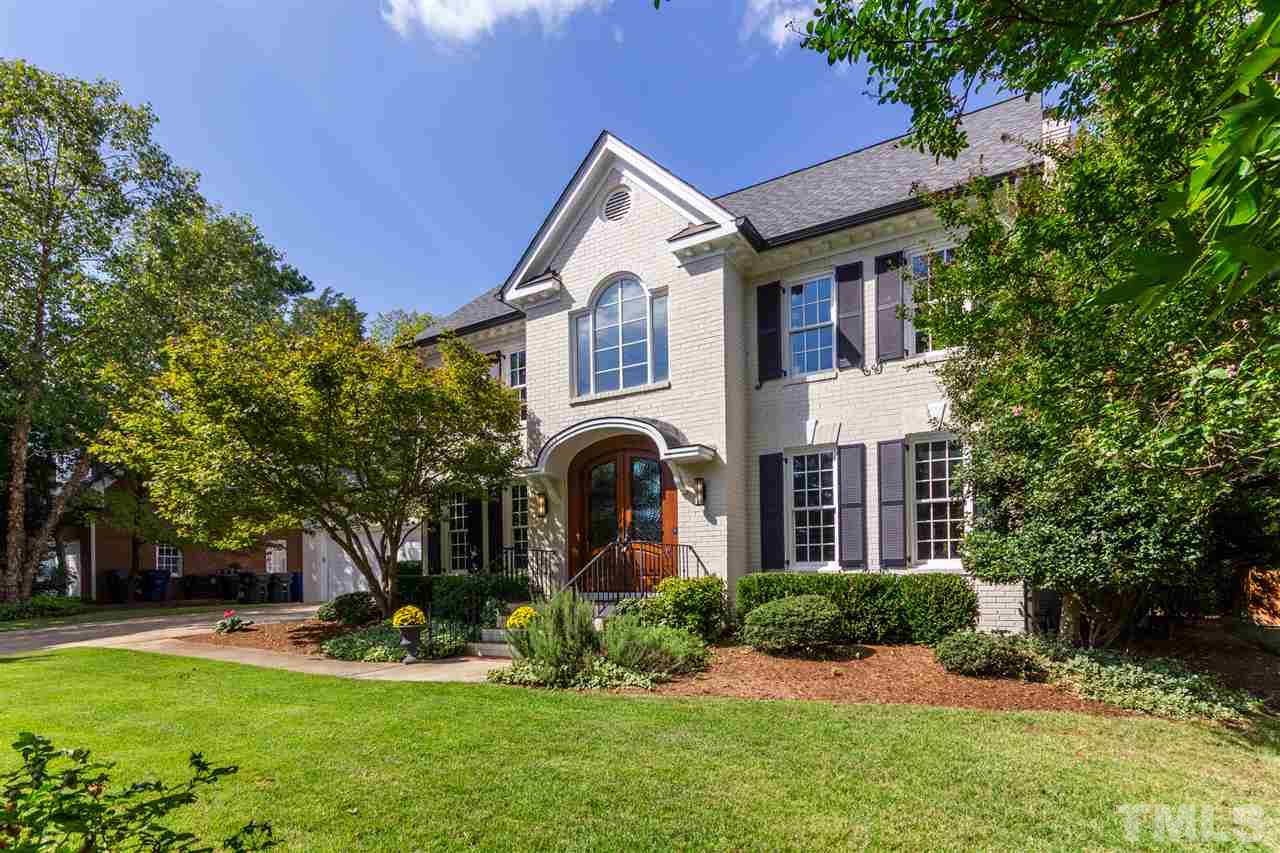 3424 Doyle Road Raleigh, NC 27607 - Photo 2 of 25 a front view of a house with a yard