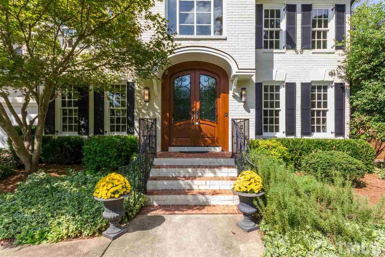 3424 Doyle Road Raleigh, NC 27607 - Photo 3 of 25 a front view of a house with garden