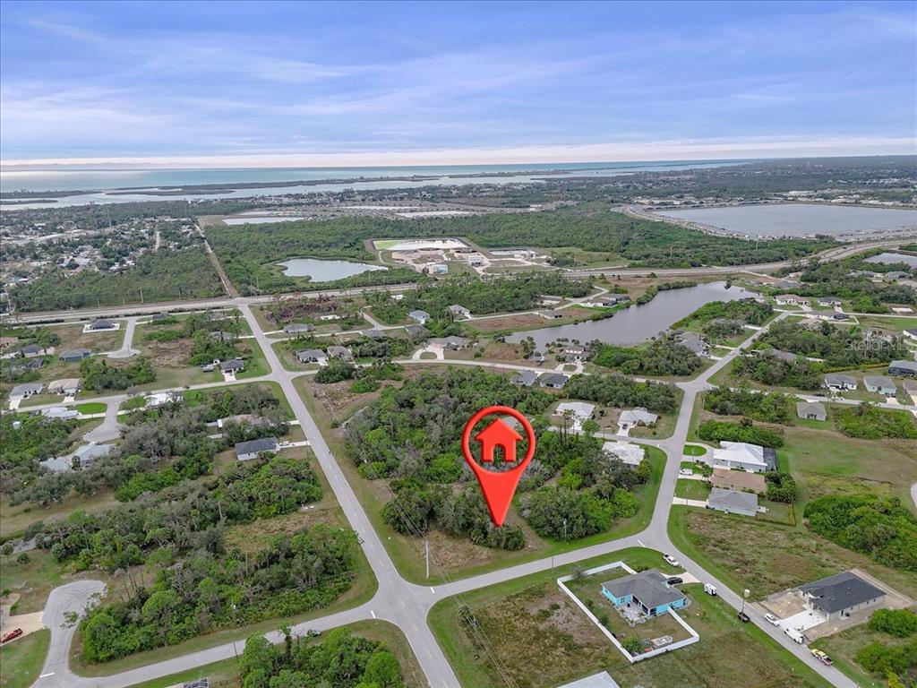 201 Hardee Way Rotonda West, FL 33947 - Photo 14 of 20 an aerial view of residential houses with outdoor space