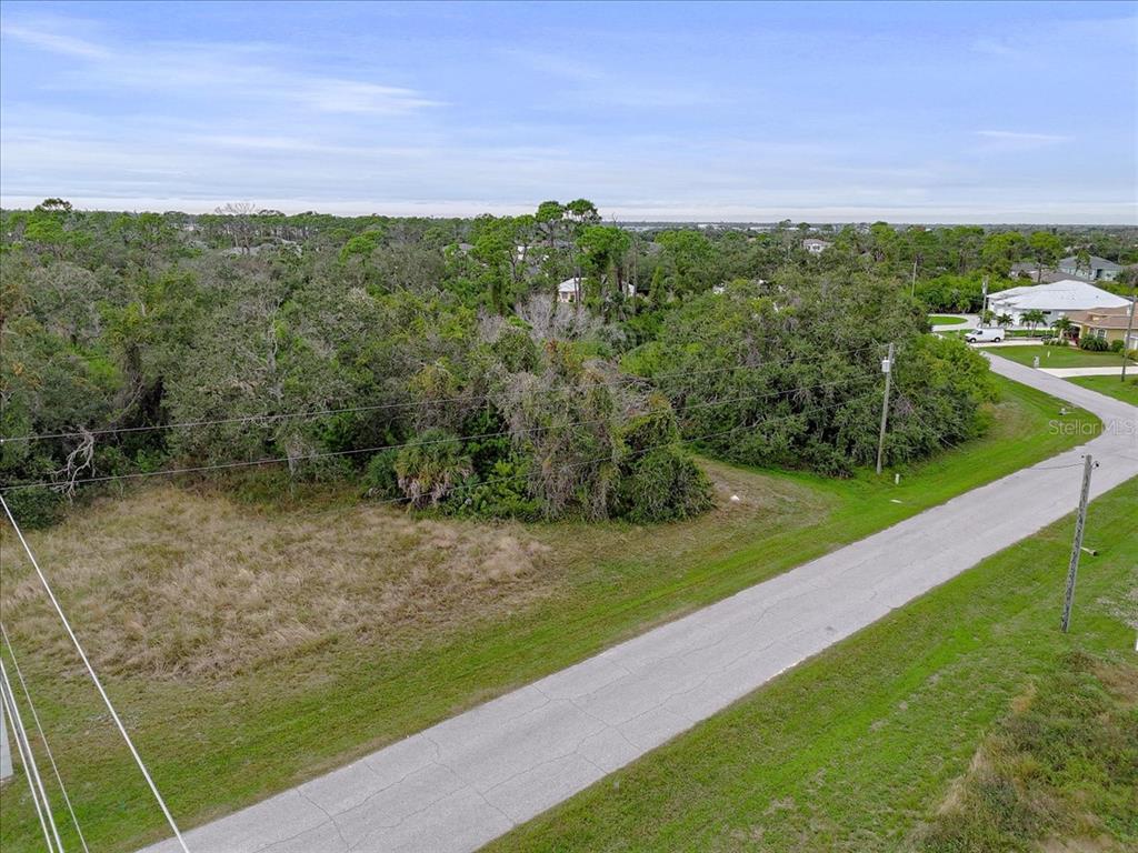 201 Hardee Way Rotonda West, FL 33947 - Photo 20 of 20 a view of a field with an ocean