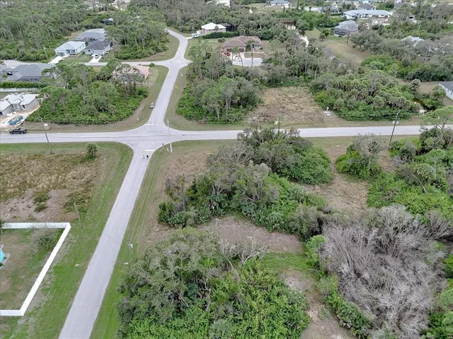 an aerial view of residential house with outdoor space