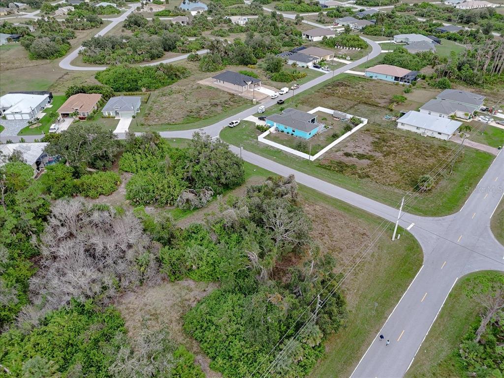 201 Hardee Way Rotonda West, FL 33947 - Photo 9 of 20 an aerial view of a house with a yard