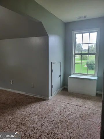 an empty room with a window