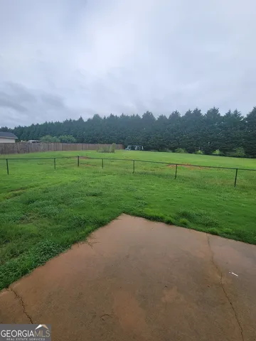 a view of a golf course with a lake