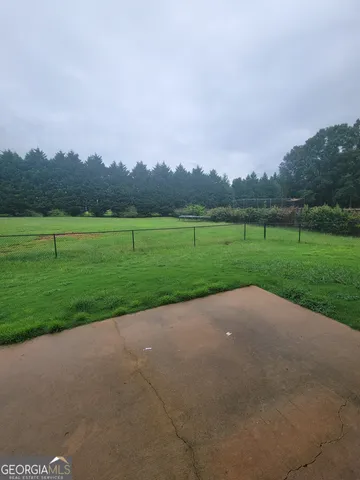 a view of a golf course with a lake