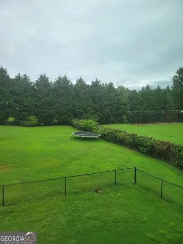 a view of an outdoor space and a yard