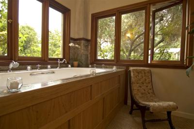 4193 Big Ranch Road Napa, CA 94558 - Photo 5 of 12 a bathroom with a double vanity sink and a large mirror