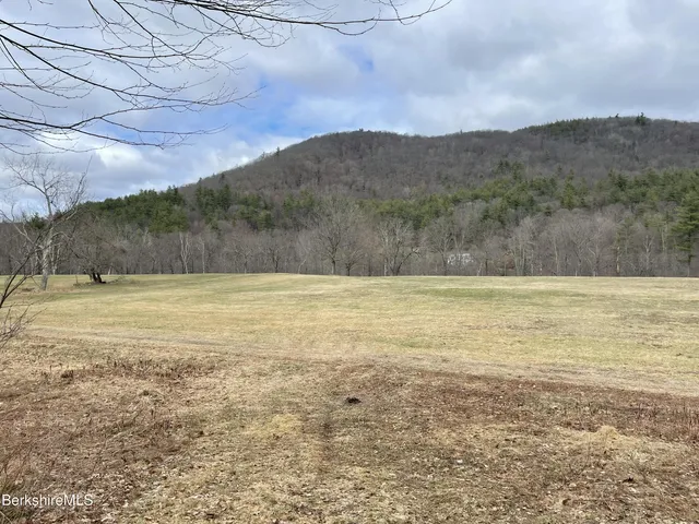 a view of a lake view and mountains