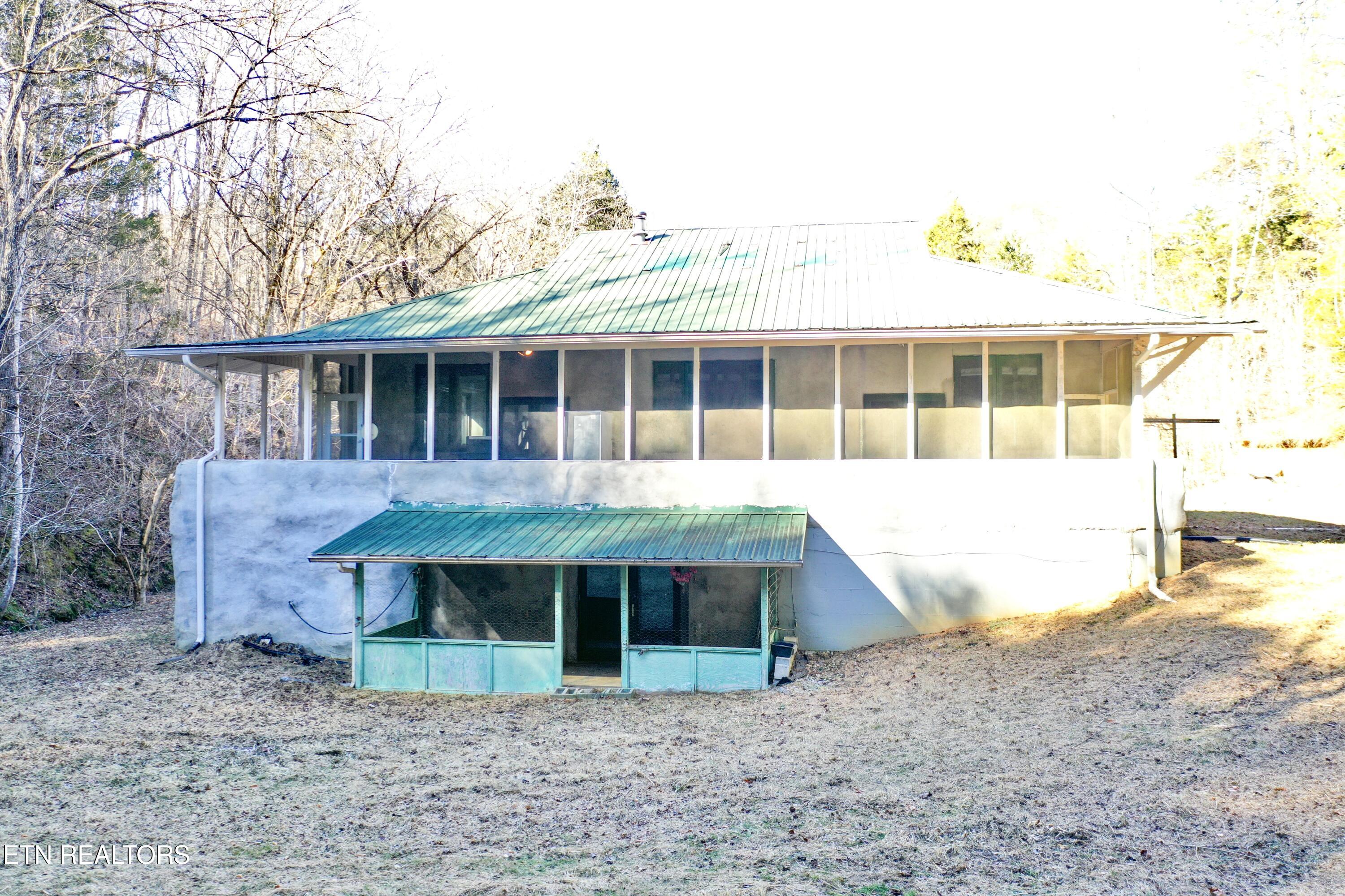 1650 Indian Creek Road Thorn Hill, TN 37881 - Photo 1 of 51 Backyard looking to back of house