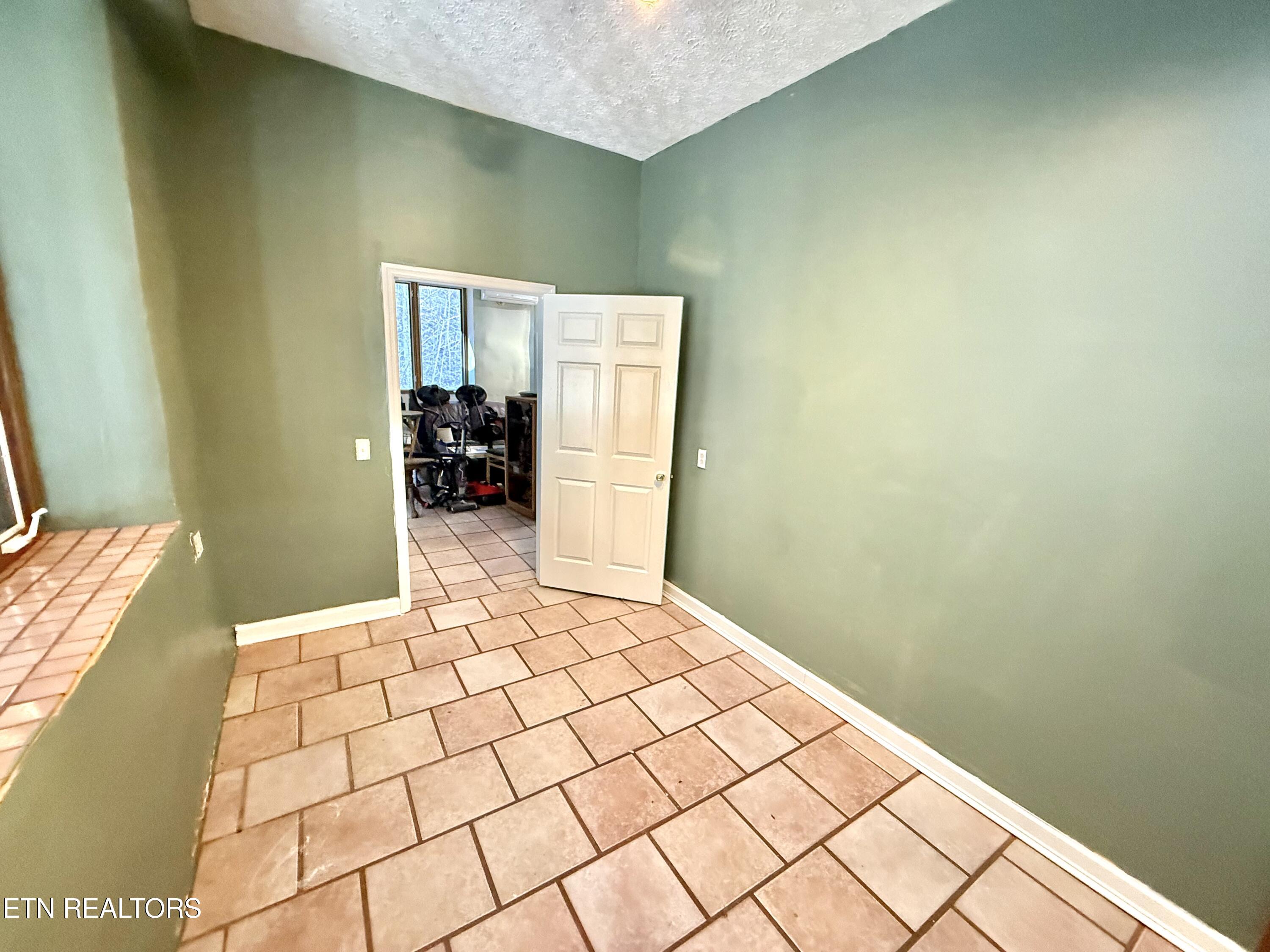 1650 Indian Creek Road Thorn Hill, TN 37881 - Photo 14 of 51 Office area leading to main bedroom