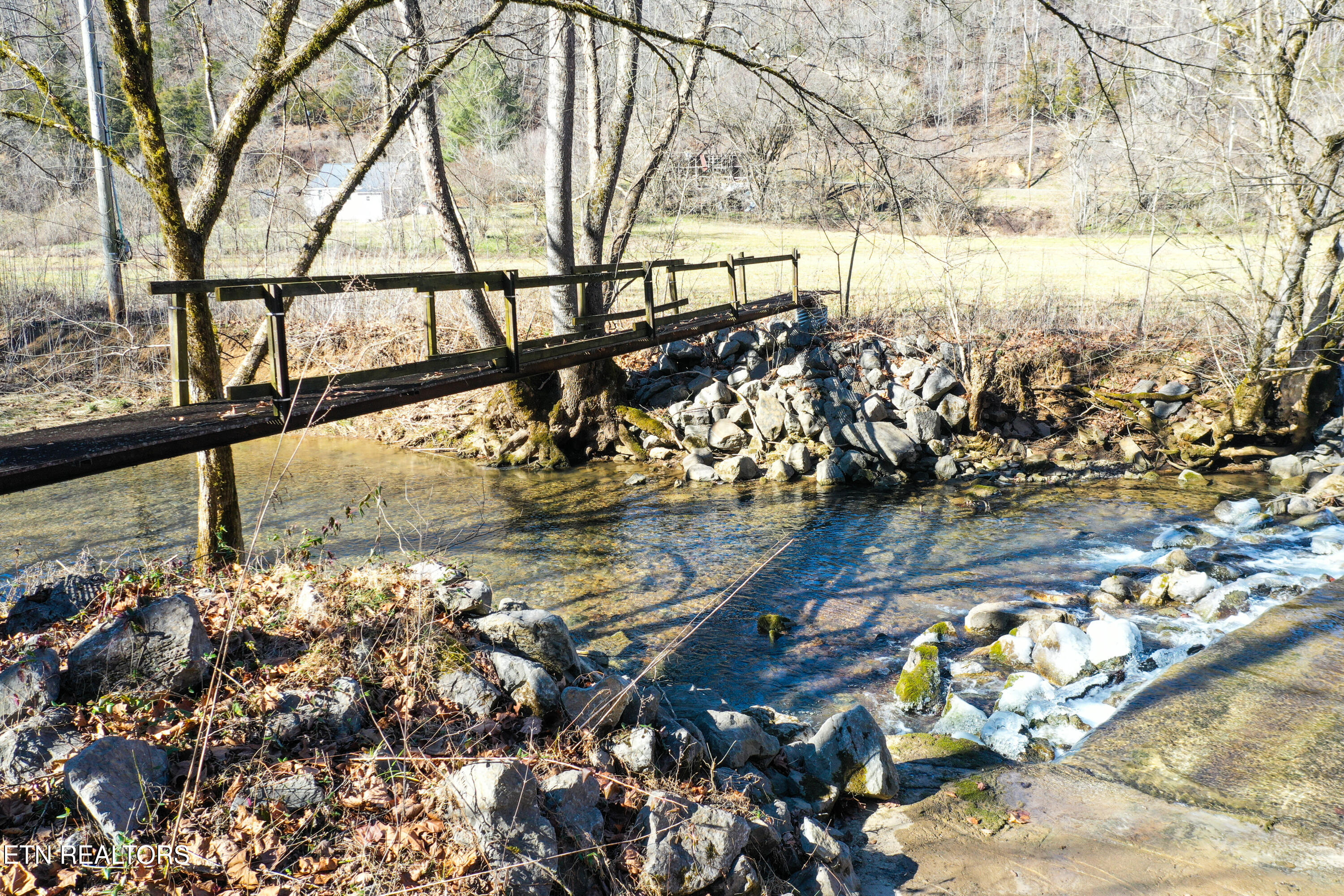 1650 Indian Creek Road Thorn Hill, TN 37881 - Photo 38 of 51 walking bridge across the creek