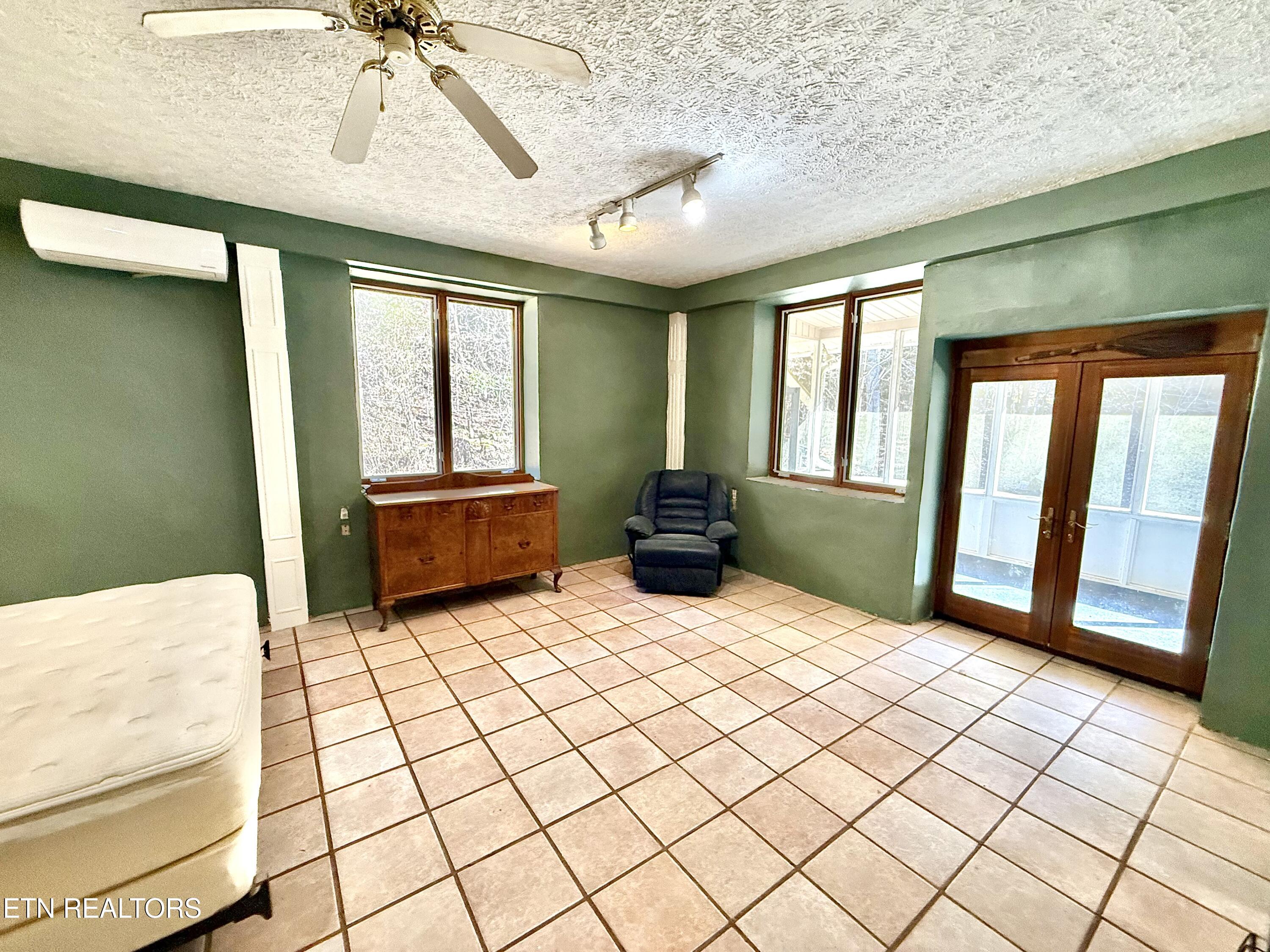 1650 Indian Creek Road Thorn Hill, TN 37881 - Photo 8 of 51 Main bedroom and doors to covered deck
