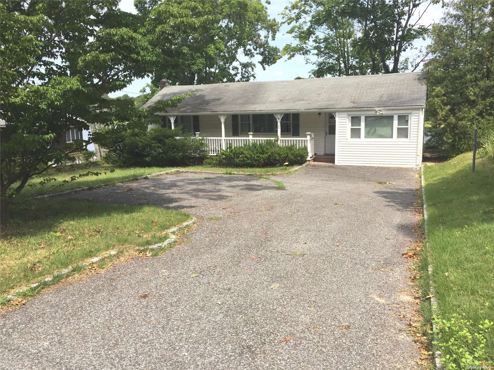 187 Lakeside Trail Ridge, NY 11961 - Photo 1 of 1 a view of a yard in front of house