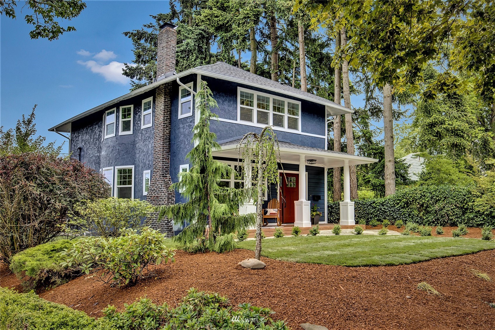 944 26th Avenue Seattle, WA 98122 - Photo 1 of 40 a front view of a house with garden