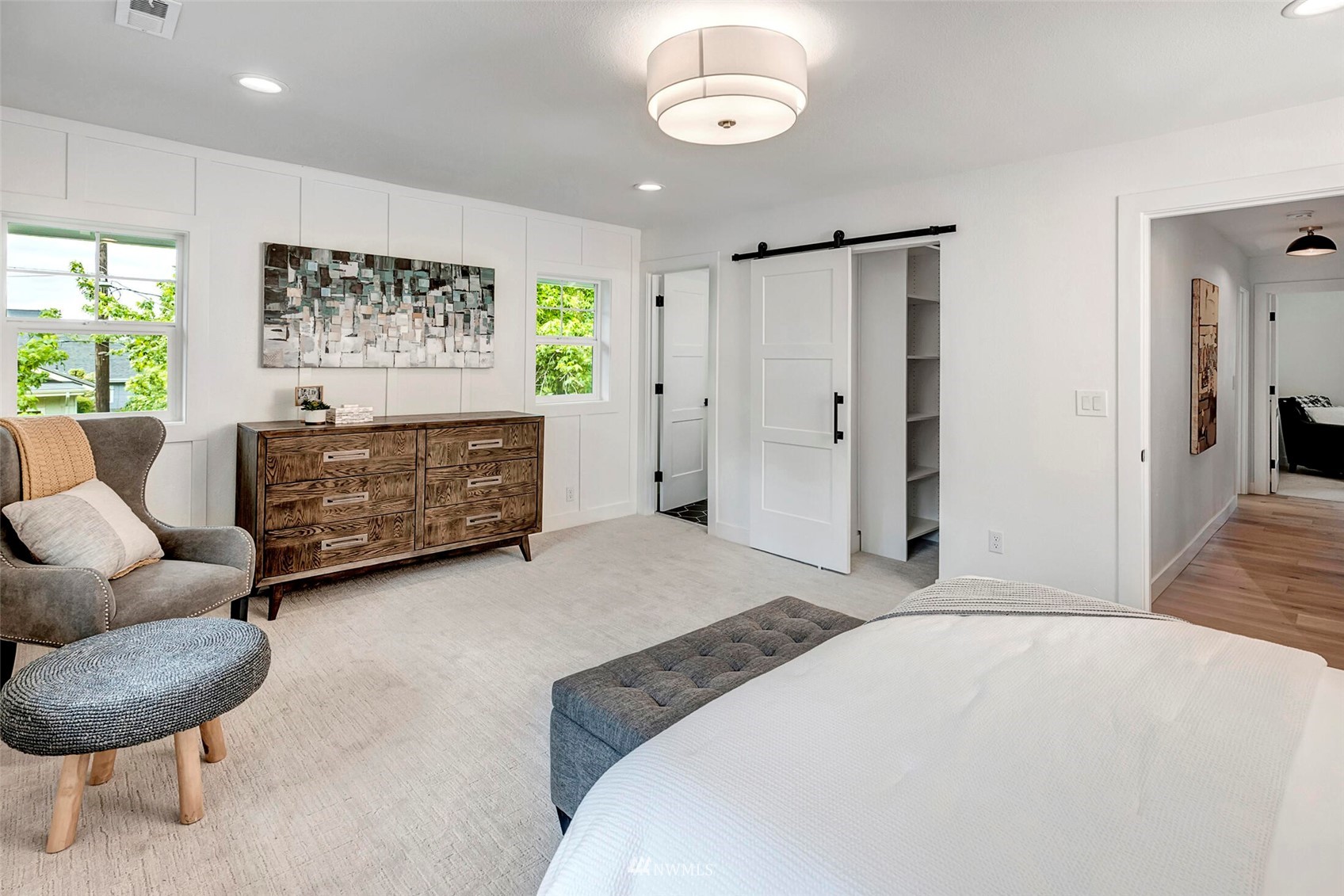 944 26th Avenue Seattle, WA 98122 - Photo 18 of 40 a spacious bedroom with a bed and a couch