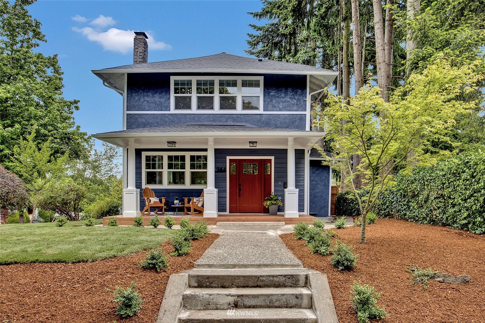 944 26th Avenue Seattle, WA 98122 - Photo 2 of 40 a front view of a house with a yard