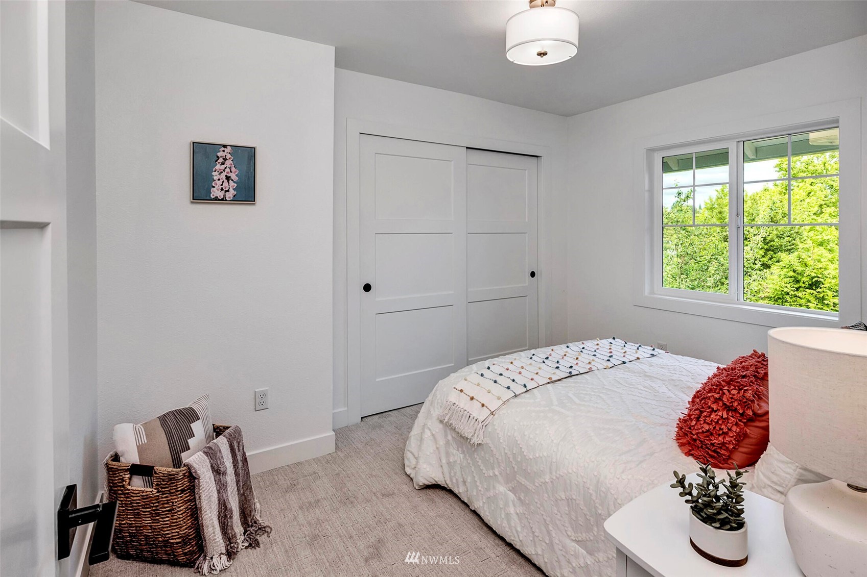 944 26th Avenue Seattle, WA 98122 - Photo 23 of 40 a bedroom with a bed and a window