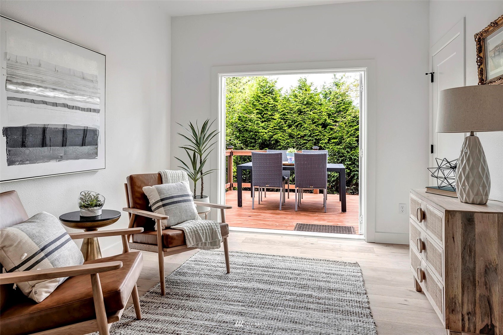 944 26th Avenue Seattle, WA 98122 - Photo 9 of 40 a living room with furniture a fireplace and a floor to ceiling window