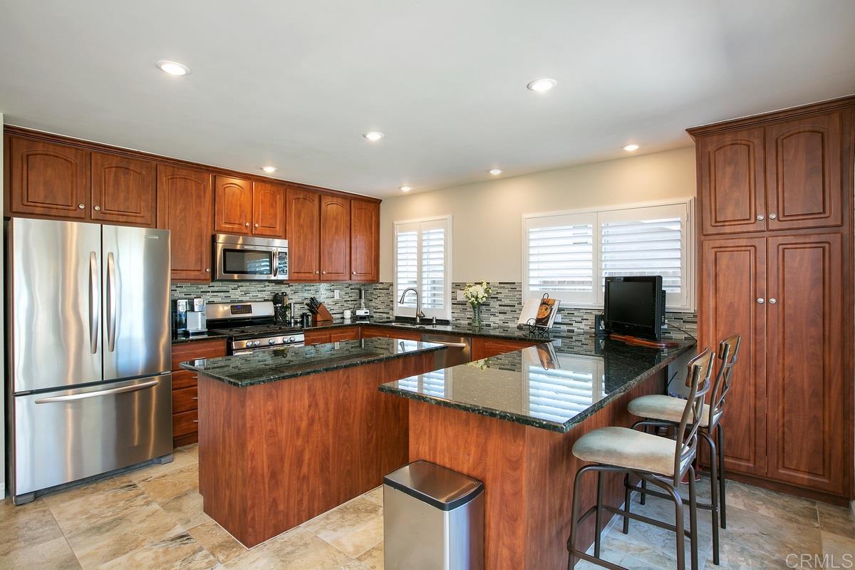 110 5 Crowns Way Encinitas, CA 92024 - Photo 1 of 25 Granite counters. Stainless appliances. New can lights. Opens to back yard.