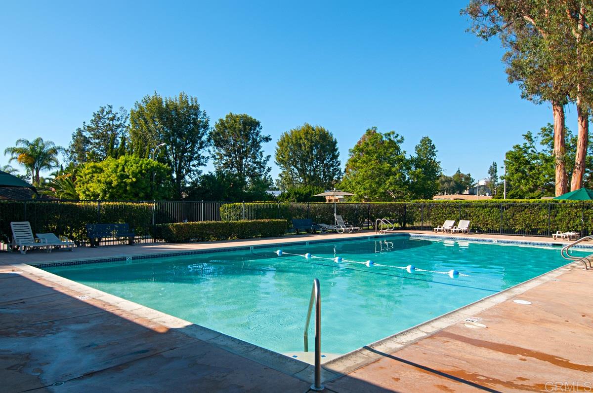 110 5 Crowns Way Encinitas, CA 92024 - Photo 11 of 25 HOA pool includes spa, tennis courts, club house, playground and green belt