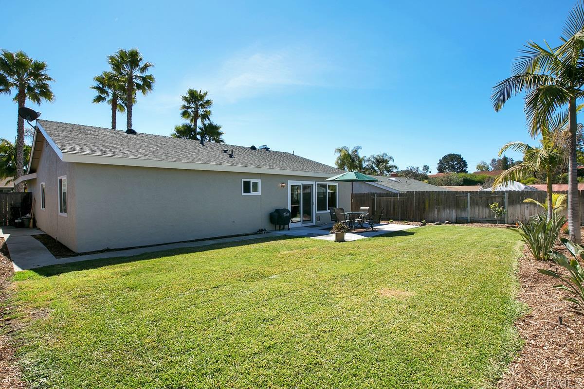 110 5 Crowns Way Encinitas, CA 92024 - Photo 6 of 25 Backyard is pool size and open. Blank canvas to do what you want. Several fruit trees and nicely landscaped.