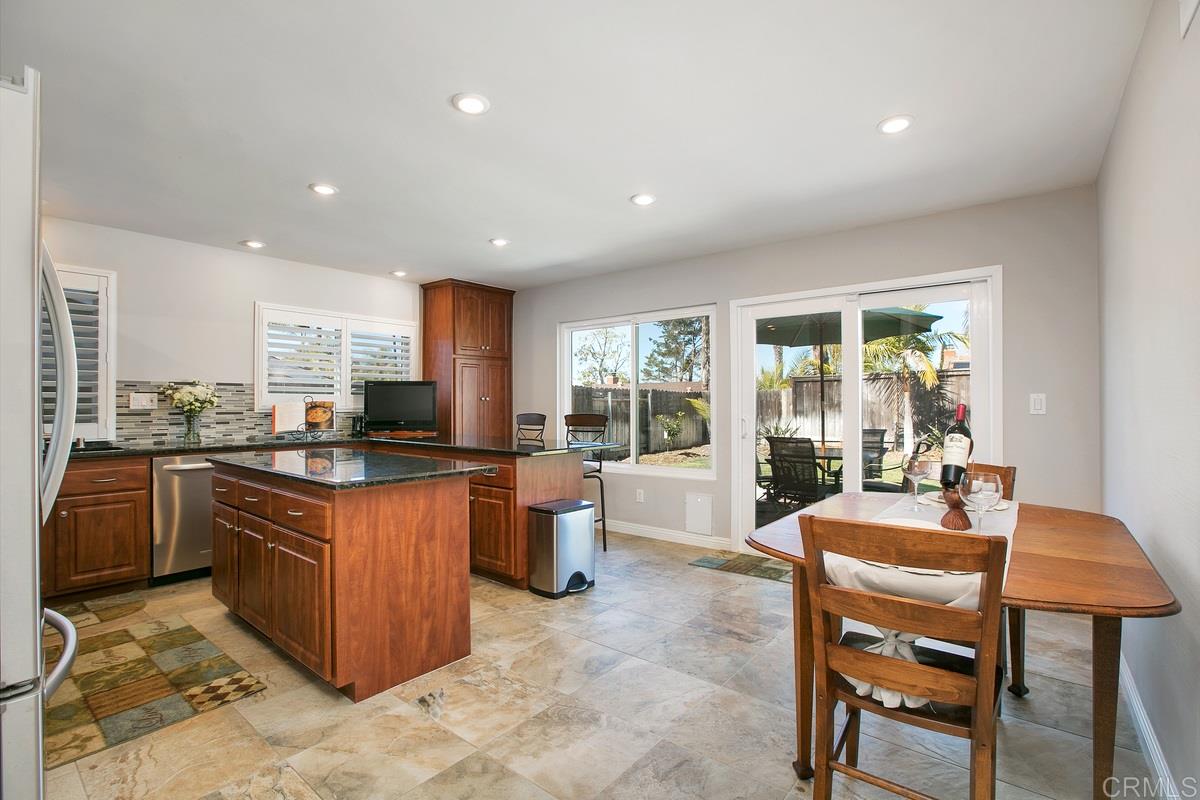 110 5 Crowns Way Encinitas, CA 92024 - Photo 10 of 25 Newer kitchen remodel w/ stainless appliances, new Milgard windows and slider with tile accent