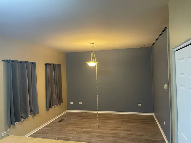 a view of a room with a door