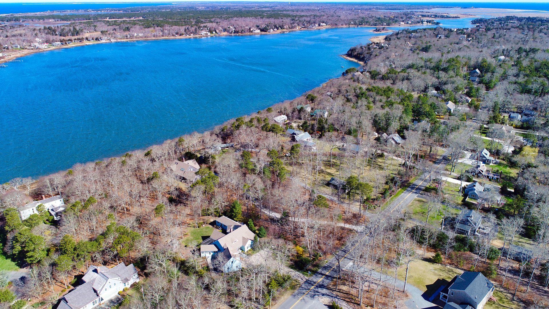 144 Tonset Road Orleans, MA 02653 - Photo 35 of 37 a view of ocean with a building