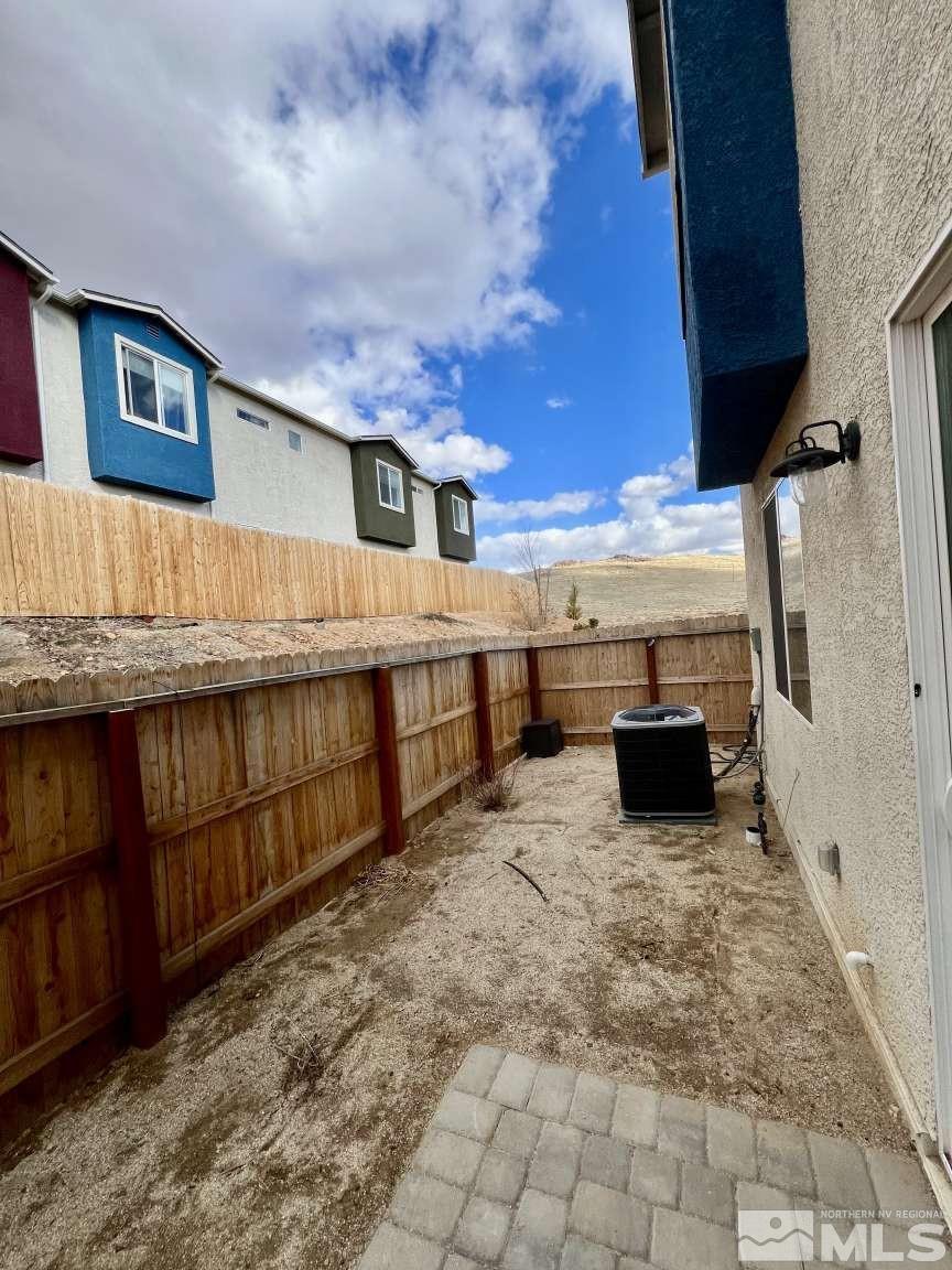 4880 Little Rock Way Sun Valley, NV 89433 - Photo 25 of 30 a view of house with outdoor space