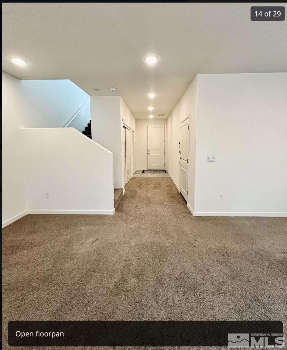 4880 Little Rock Way Sun Valley, NV 89433 - Photo 6 of 30 a view of a big room